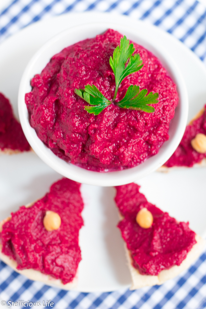A deliciously creamy, sweet yet savoury vibrant pink roasted beet hummus to snack on with veggie sticks, crackers or even by the spoonful! Warning: love at first taste guaranteed!