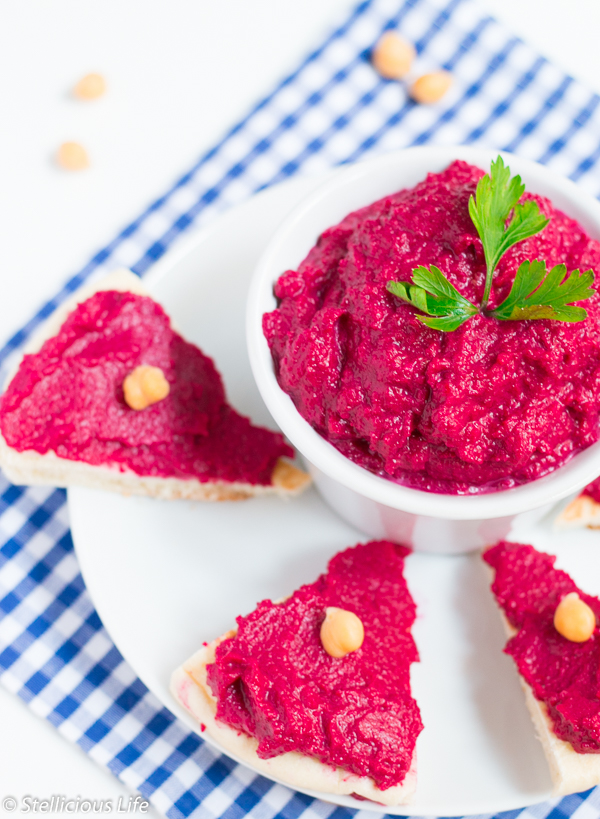 A deliciously creamy, sweet yet savoury vibrant pink roasted beet hummus to snack on with veggie sticks, crackers or even by the spoonful! Warning: love at first taste guaranteed!